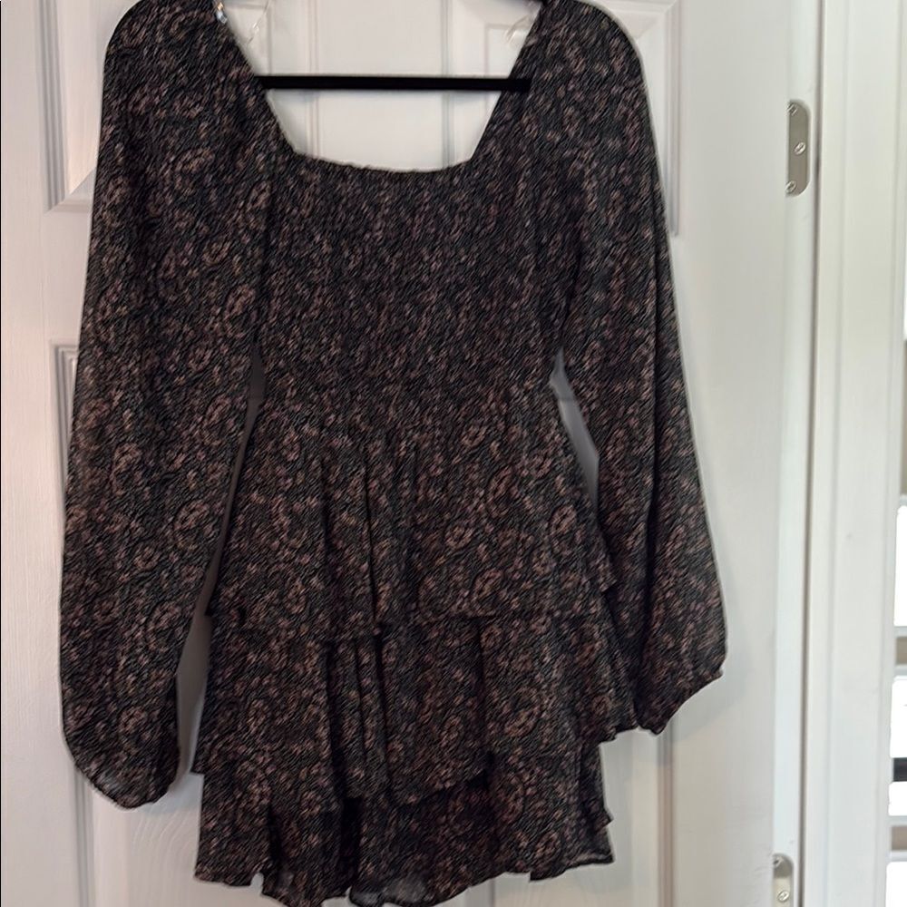 Ruffled romper by Entro! Sheer sleeves! Looks like a dress!